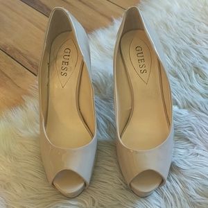 Tan Guess platform pumps